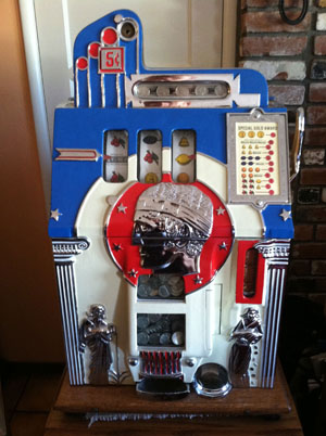 Mills Roman Head Antique Slot Machine